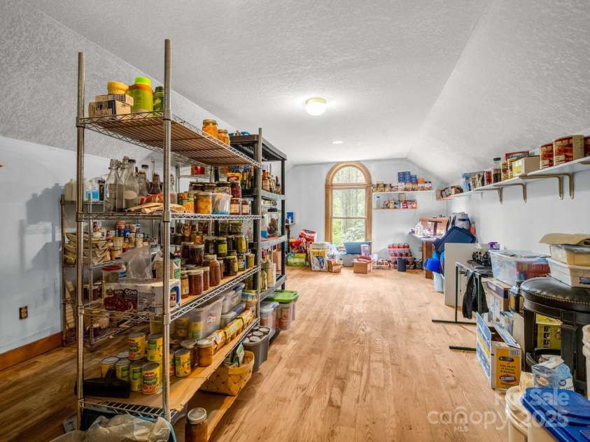 560 Charleys Knob Road, Pisgah Forest, NC 28768.  MLS# CAR4246535, YatesRealty ID 6002. Finished room over garage