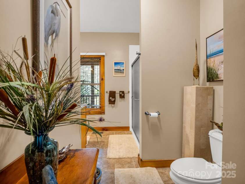 560 Charleys Knob Road, Pisgah Forest, NC 28768.  MLS# CAR4246535, YatesRealty ID 6002. Full bath main level hall