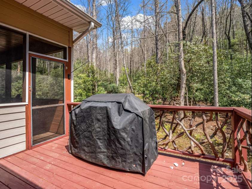 560 Charleys Knob Road, Pisgah Forest, NC 28768.  MLS# CAR4246535, YatesRealty ID 6002. Open porch off screened in