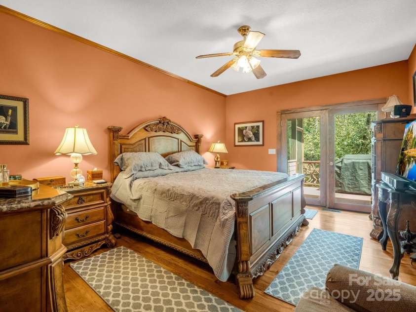 560 Charleys Knob Road, Pisgah Forest, NC 28768.  MLS# CAR4246535, YatesRealty ID 6002. Primary on main level with back porch access