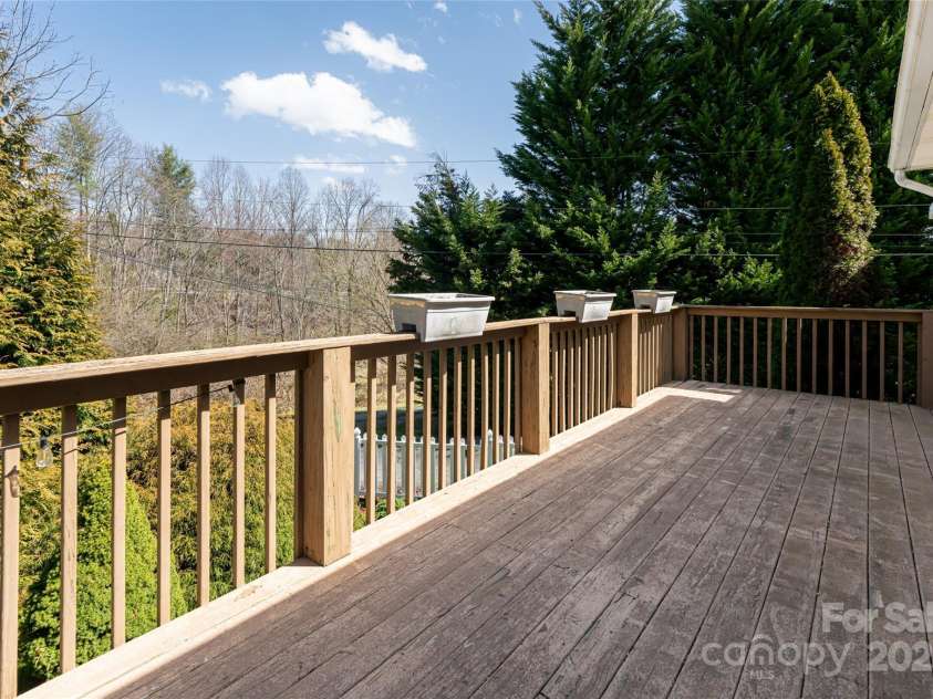 338 Morgan Road, Candler, NC 28715.  MLS# CAR4224621, YatesRealty ID 6004. Deck at apartment