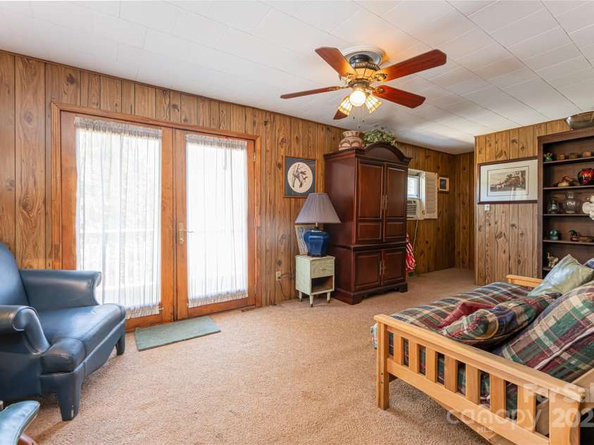 338 Morgan Road, Candler, NC 28715.  MLS# CAR4224621, YatesRealty ID 6004. Living Room in apartment