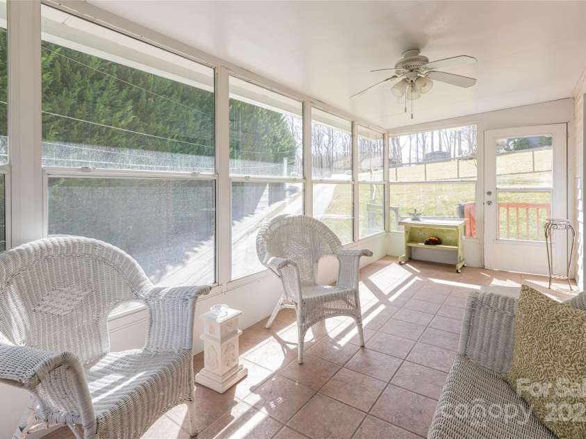 338 Morgan Road, Candler, NC 28715.  MLS# CAR4224621, YatesRealty ID 6004. Sunroom in apartment