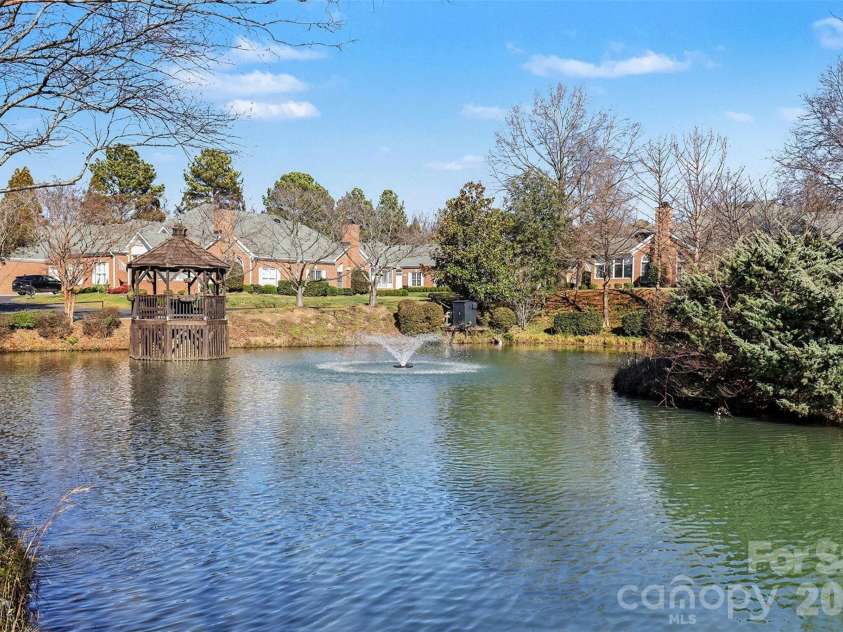 8327 Olde Troon Drive, Charlotte, NC 28277.  MLS# CAR4345406, YatesRealty ID 6006. Community pond
