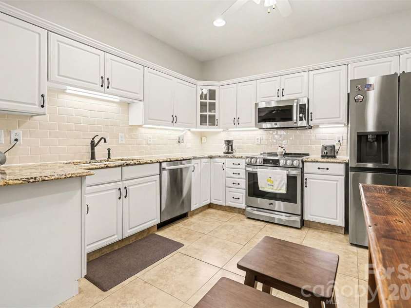 8327 Olde Troon Drive, Charlotte, NC 28277.  MLS# CAR4345406, YatesRealty ID 6006. Recently updated kitchen with induction range includes all appliances