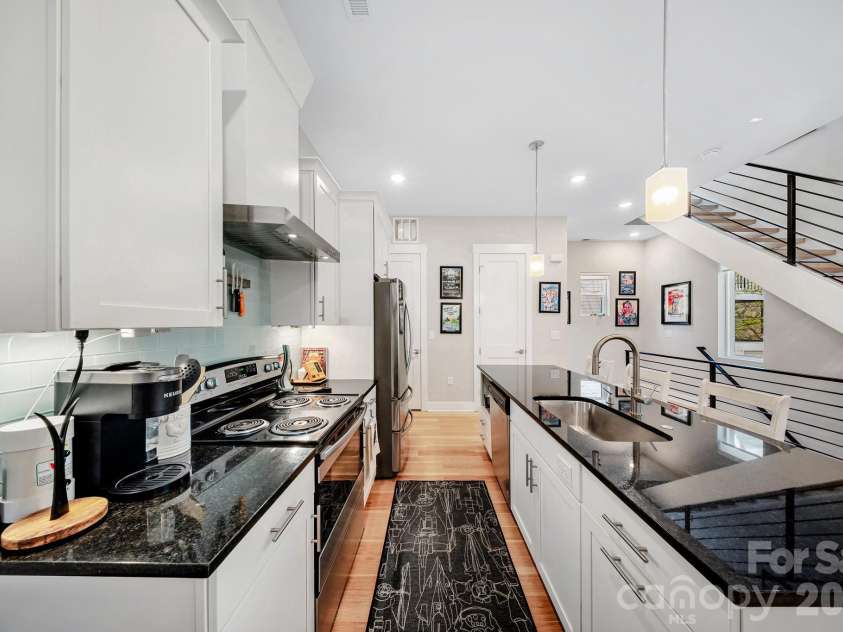1115 Greenleaf Avenue, Charlotte, NC 28202.  MLS# CAR4248840, YatesRealty ID 6007. Upper Floor Living/Dining/Kitchen