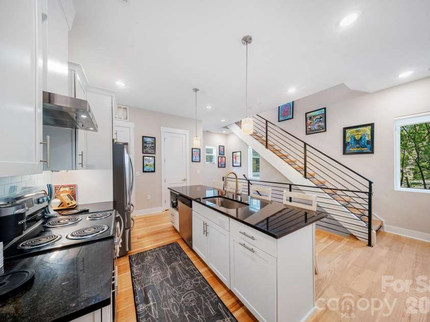 1115 Greenleaf Avenue, Charlotte, NC 28202.  MLS# CAR4248840, YatesRealty ID 6007. Upper Floor Living/Dining/Kitchen