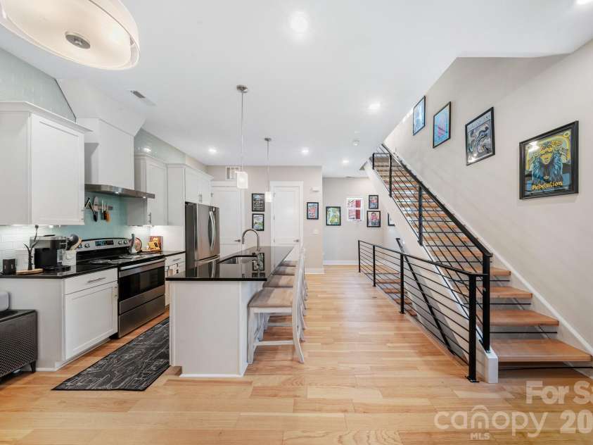 1115 Greenleaf Avenue, Charlotte, NC 28202.  MLS# CAR4248840, YatesRealty ID 6007. Upper Floor Living/Dining/Kitchen