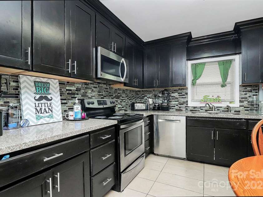 8301 Washington Boulevard, Charlotte, NC 28262.  MLS# CAR4242848, YatesRealty ID 6007. 