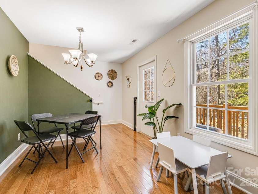 52 Kirby Road, Asheville, NC 28806.  MLS# CAR4227031, YatesRealty ID 6008. Dining room space full of natural light
