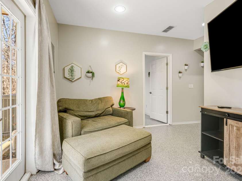 52 Kirby Road, Asheville, NC 28806.  MLS# CAR4227031, YatesRealty ID 6008. Downstairs living space