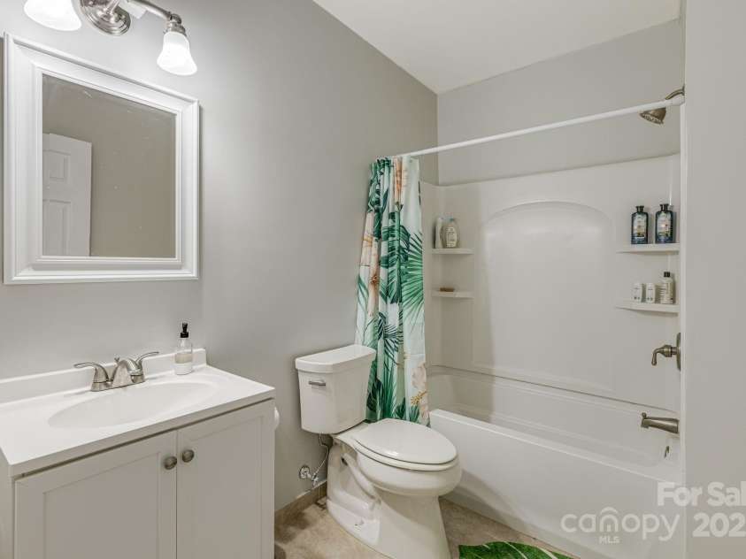 52 Kirby Road, Asheville, NC 28806.  MLS# CAR4227031, YatesRealty ID 6008. Full bath downstairs room