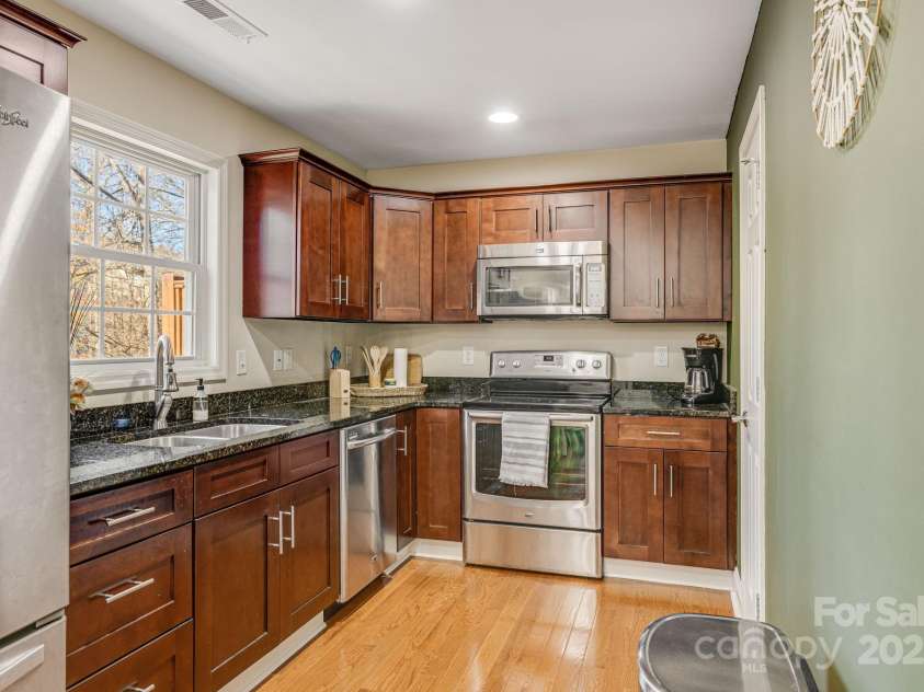 52 Kirby Road, Asheville, NC 28806.  MLS# CAR4227031, YatesRealty ID 6008. Kitchen with stone countertops