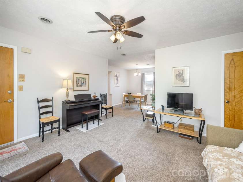 103 Oakwood Place, Hendersonville, NC 28792.  MLS# CAR4363968, YatesRealty ID 6010. Open living area
