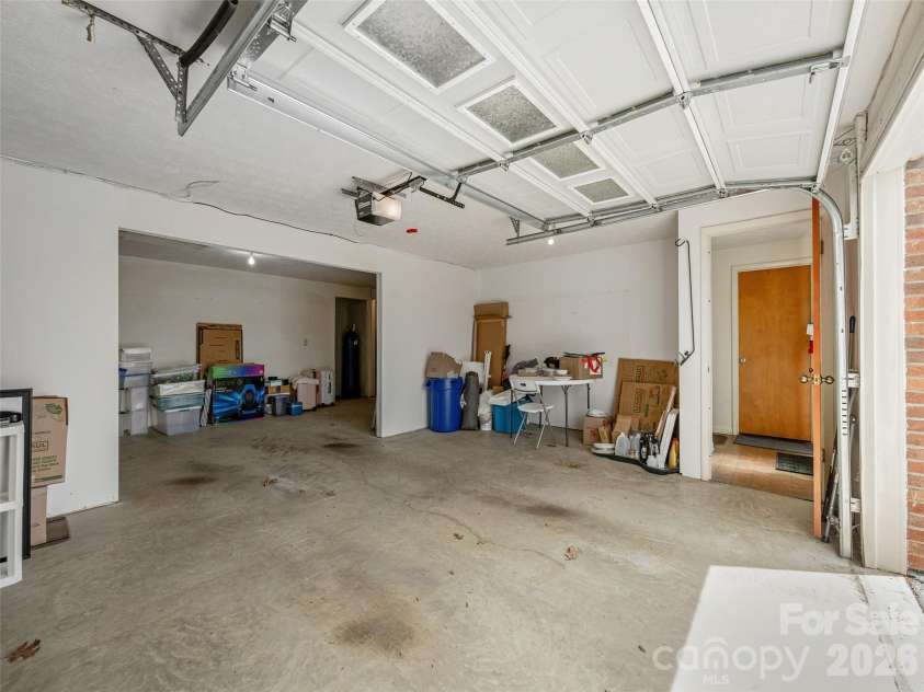 103 Oakwood Place, Hendersonville, NC 28792.  MLS# CAR4363968, YatesRealty ID 6010. Over-sized garage/storage