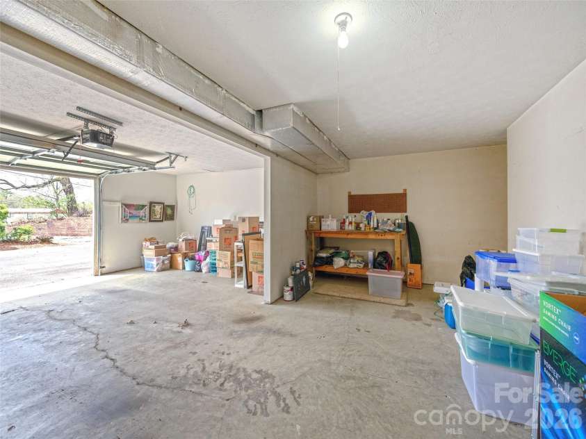 103 Oakwood Place, Hendersonville, NC 28792.  MLS# CAR4363968, YatesRealty ID 6010. Over-sized garage/storage