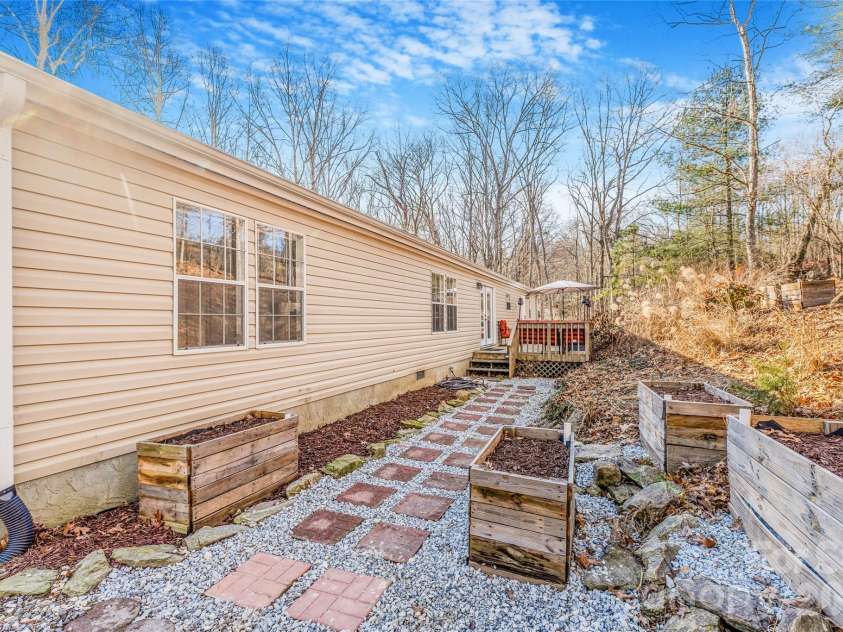 140 Crows nest Road, Hendersonville, NC 28791.  MLS# CAR4331397, YatesRealty ID 6016. Garden boxes ready for spring gardens 