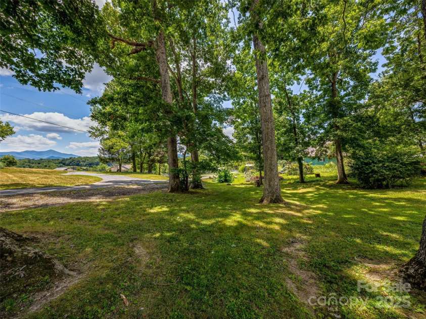 29 Tall Oaks Road, Candler, NC 28715.  MLS# CAR4163907, YatesRealty ID 6016. 