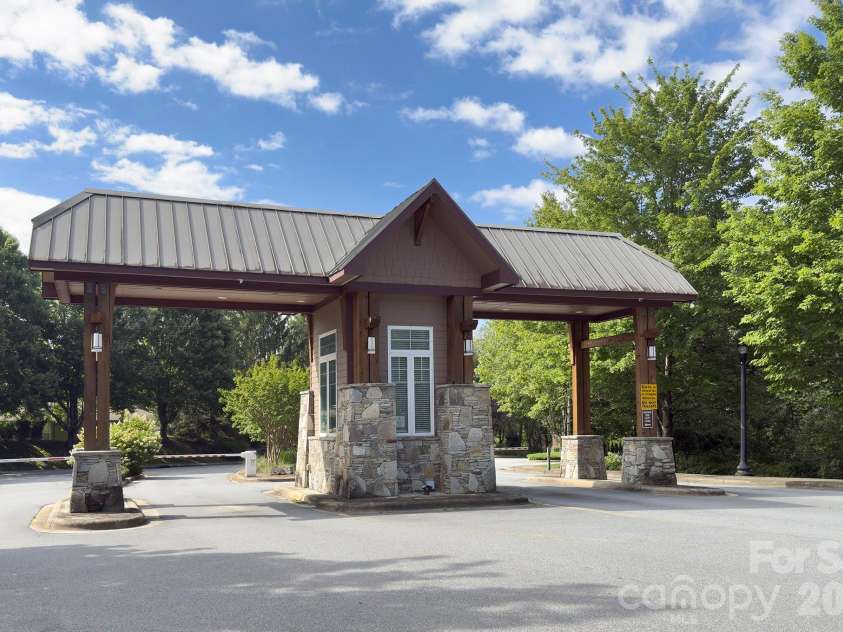 1104 Deermouse Way, Hendersonville, NC 28792.  MLS# CAR4296698, YatesRealty ID 6018. Front gate