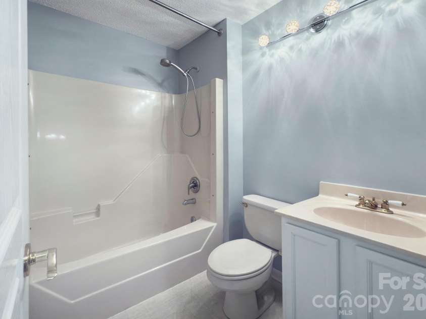 1104 Deermouse Way, Hendersonville, NC 28792.  MLS# CAR4296698, YatesRealty ID 6018. Guest bath