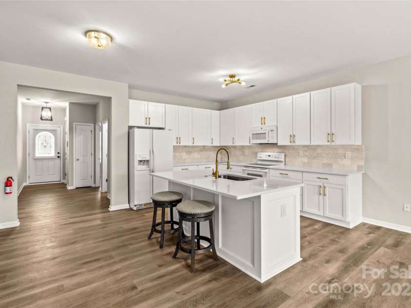 124 Zolder Lane, Mooresville, NC 28117.  MLS# CAR4213674, YatesRealty ID 6019. Entry and Open kitchen