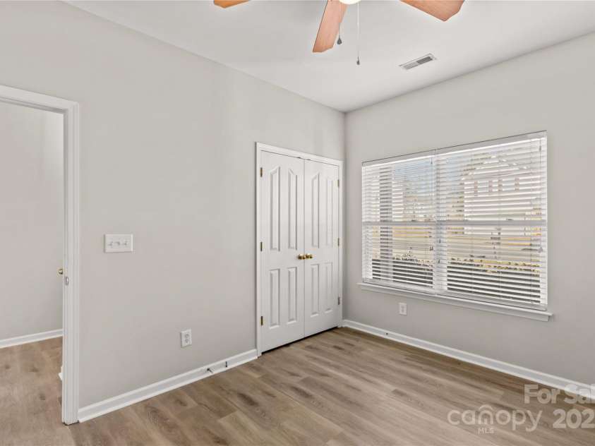 124 Zolder Lane, Mooresville, NC 28117.  MLS# CAR4213674, YatesRealty ID 6019. Front Bedroom #2 with large closet