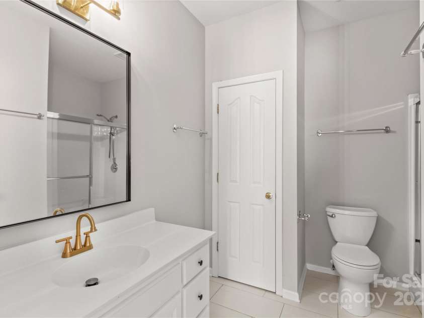 124 Zolder Lane, Mooresville, NC 28117.  MLS# CAR4213674, YatesRealty ID 6019. Primary bath with additional linen closet
