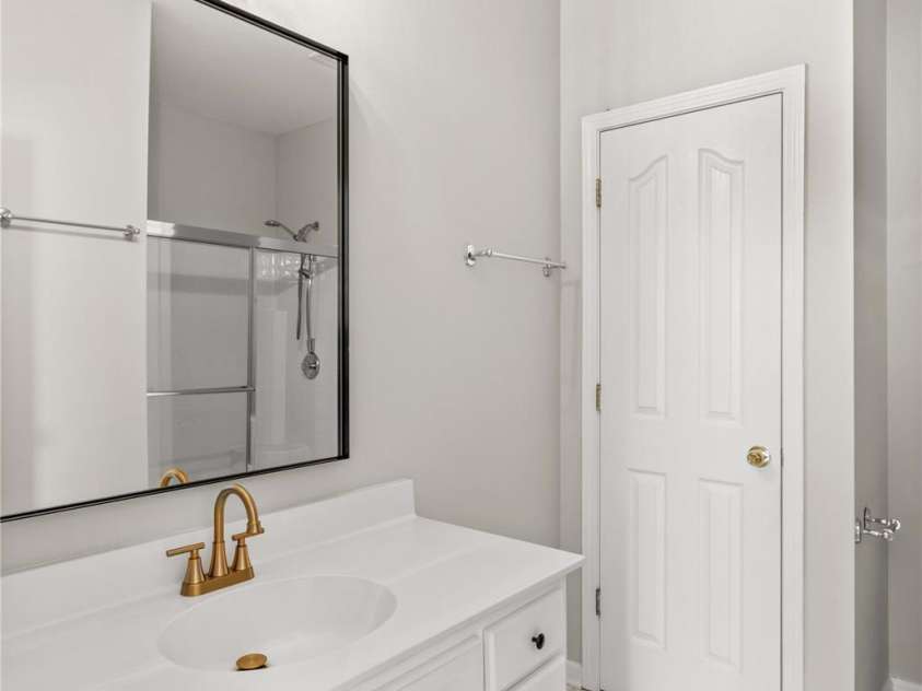 124 Zolder Lane, Mooresville, NC 28117.  MLS# CAR4213674, YatesRealty ID 6019. Primary Bath with tile flooring