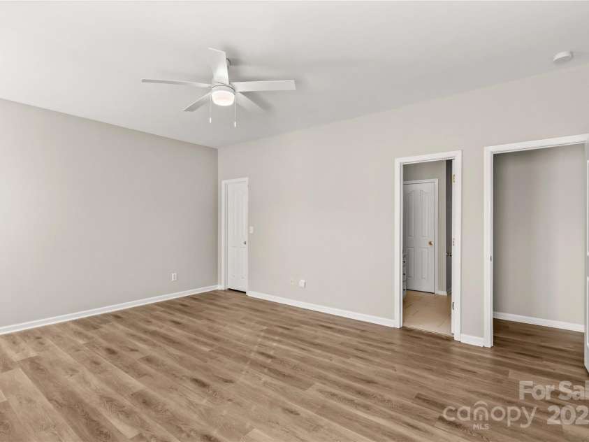 124 Zolder Lane, Mooresville, NC 28117.  MLS# CAR4213674, YatesRealty ID 6019. Primary Bedroom and access to primary bath