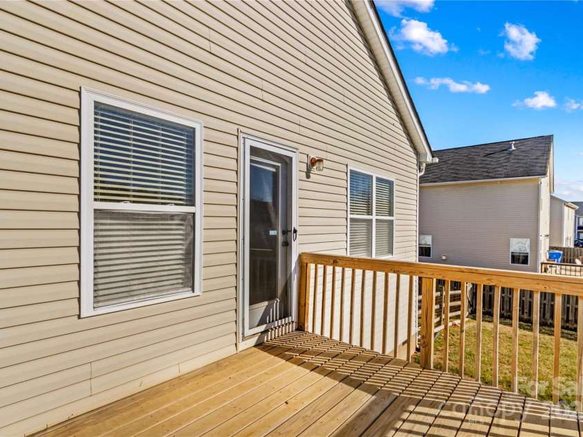 124 Zolder Lane, Mooresville, NC 28117.  MLS# CAR4213674, YatesRealty ID 6019. Rear deck