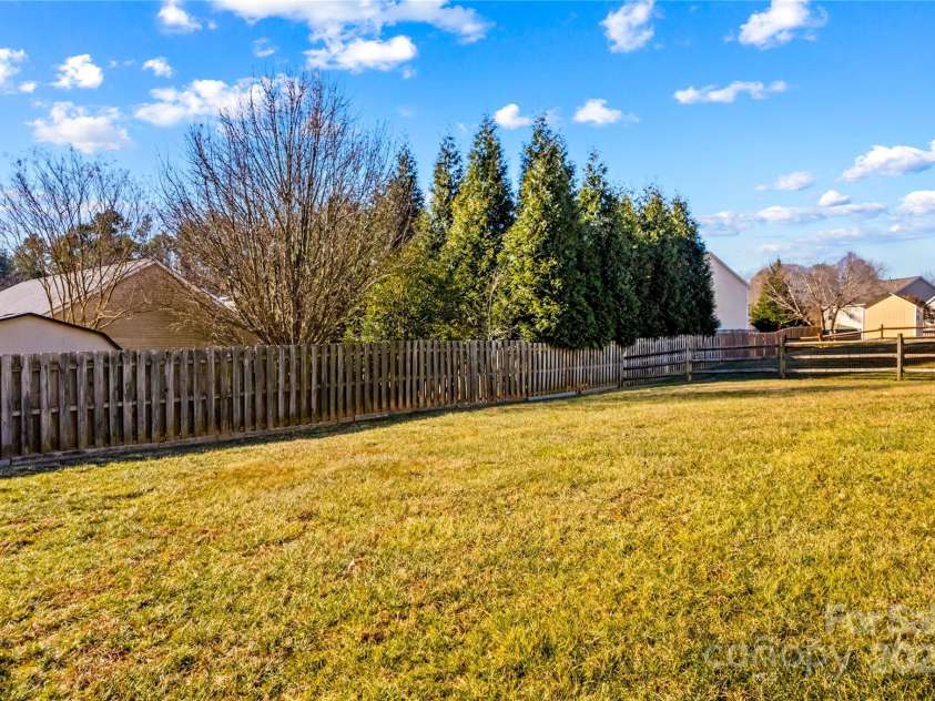 124 Zolder Lane, Mooresville, NC 28117.  MLS# CAR4213674, YatesRealty ID 6019. Rear yard