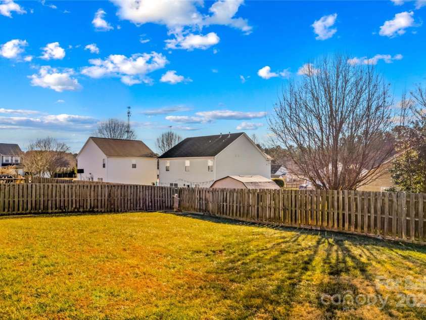 124 Zolder Lane, Mooresville, NC 28117.  MLS# CAR4213674, YatesRealty ID 6019. Rear yard