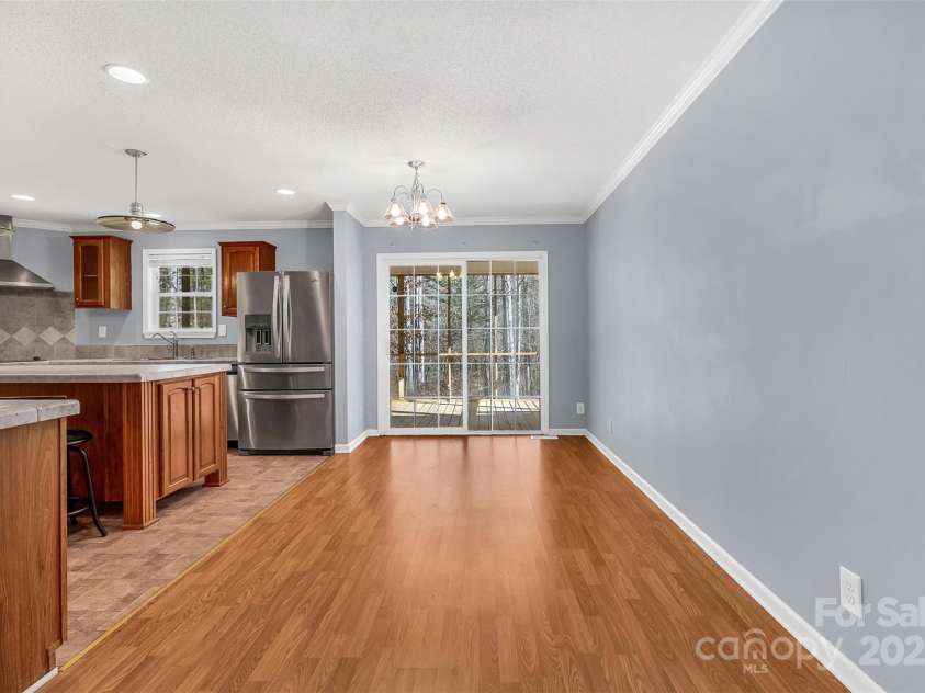 530 Ole Simpson Place, Catawba, SC 29704.  MLS# CAR4329063, YatesRealty ID 6021. Dining Area - Entry from Screened Porch