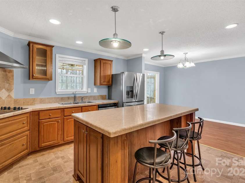 530 Ole Simpson Place, Catawba, SC 29704.  MLS# CAR4329063, YatesRealty ID 6021. Kitchen into Dining Area