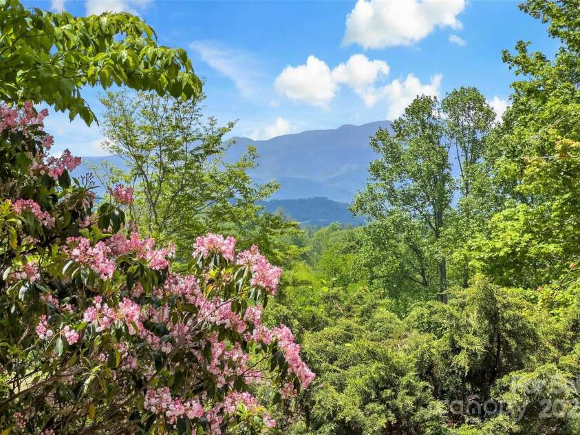 389 Orchard Road, Bakersville, NC 28705.  MLS# CAR4241299, YatesRealty ID 6026. 