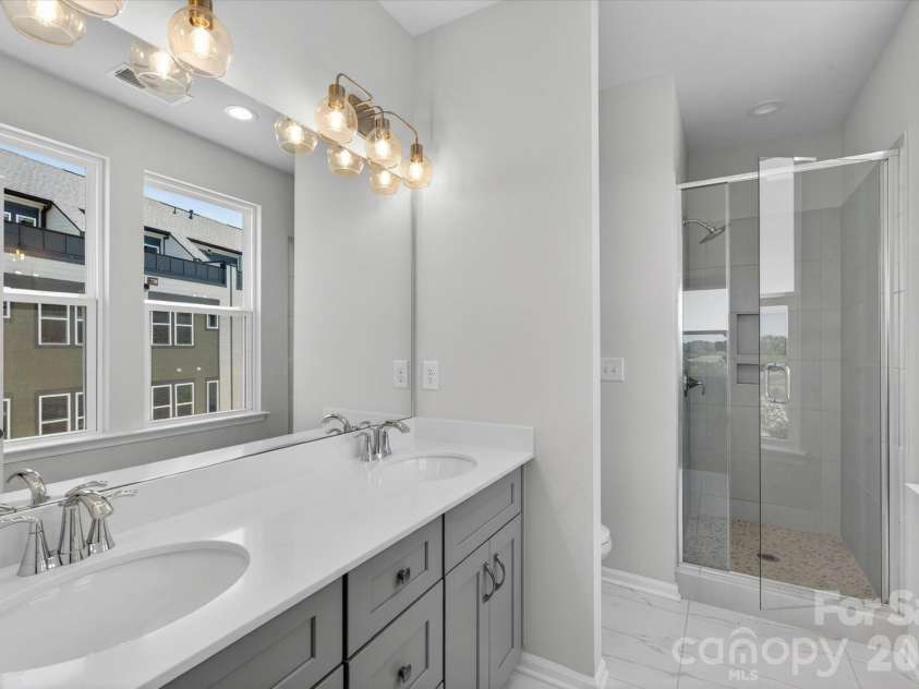 1610 Spring Street, Charlotte, NC 28206.  MLS# CAR4316230, YatesRealty ID 6031. Premier Bath