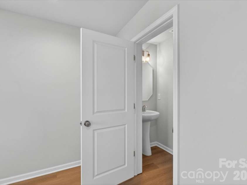 1618 Spring Street, Charlotte, NC 28206.  MLS# CAR4316240, YatesRealty ID 6033. 1st Floor Flex Room Powder Bath
