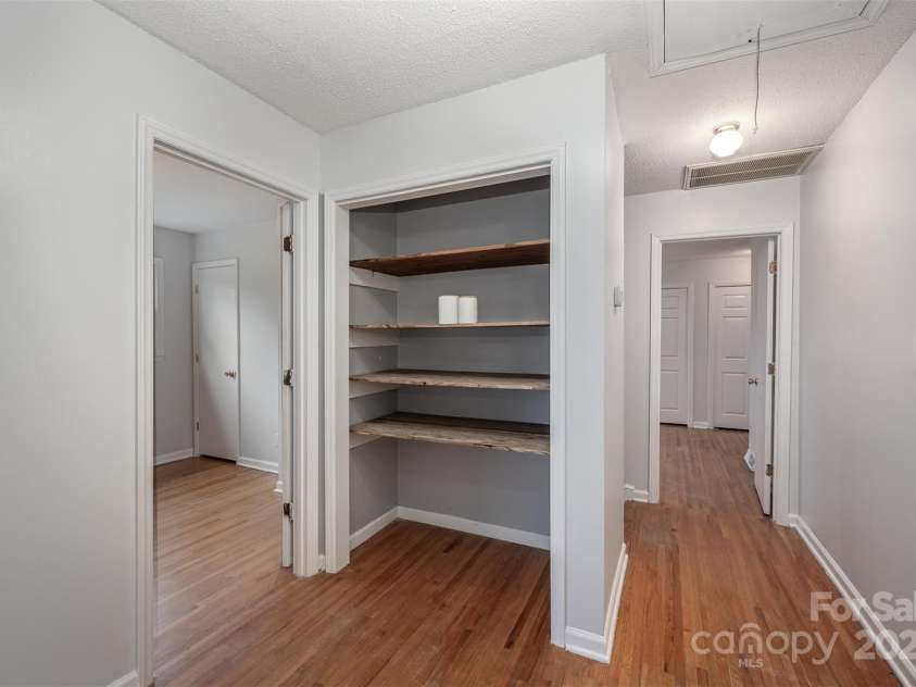 16308 Poplar Tent Road, Huntersville, NC 28078.  MLS# CAR4302372, YatesRealty ID 6033. Upstairs lining closet