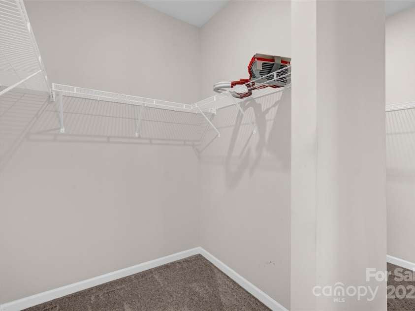 111 Bell Chase Lane, Statesville, NC 28677.  MLS# CAR4233934, YatesRealty ID 6035. Huge double sided primary walk in closet