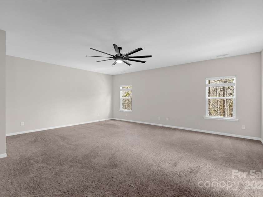 111 Bell Chase Lane, Statesville, NC 28677.  MLS# CAR4233934, YatesRealty ID 6035. Primary Bedroom offers tons of space for furniture and sitting area
