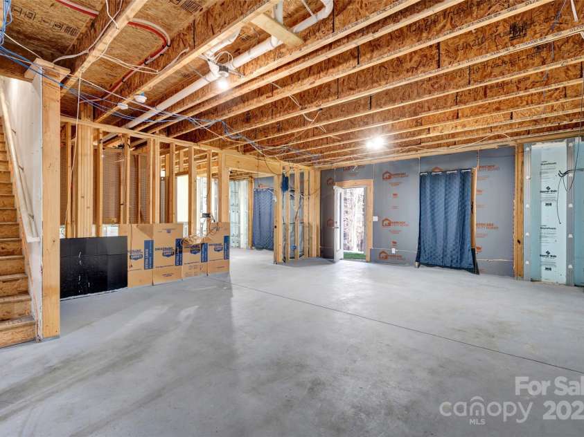 111 Bell Chase Lane, Statesville, NC 28677.  MLS# CAR4233934, YatesRealty ID 6035. So much potential for recreation areas, exercise room, media center.  Fully insulated walls and metal studs