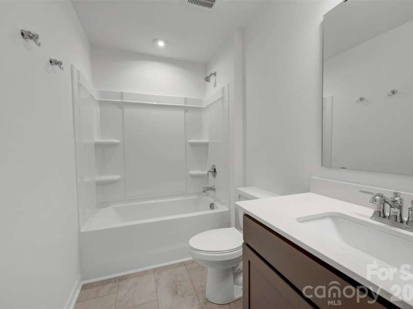 1156 Overbrook Place, Wingate, NC 28174.  MLS# CAR4360525, YatesRealty ID 6041. Secondary bathroom