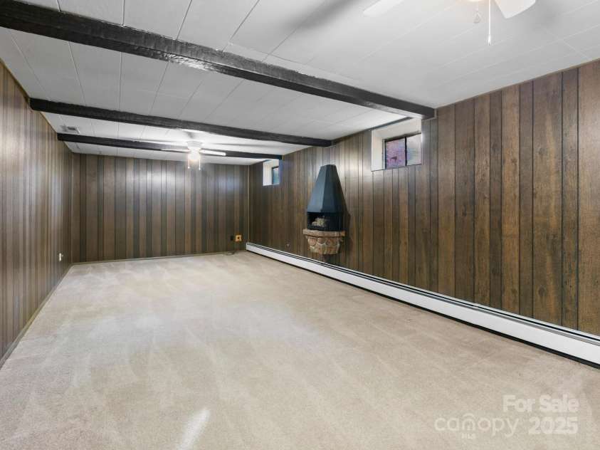 11 Aloha Circle, Candler, NC 28715.  MLS# CAR4313548, YatesRealty ID 605. Finished Den in Basement 