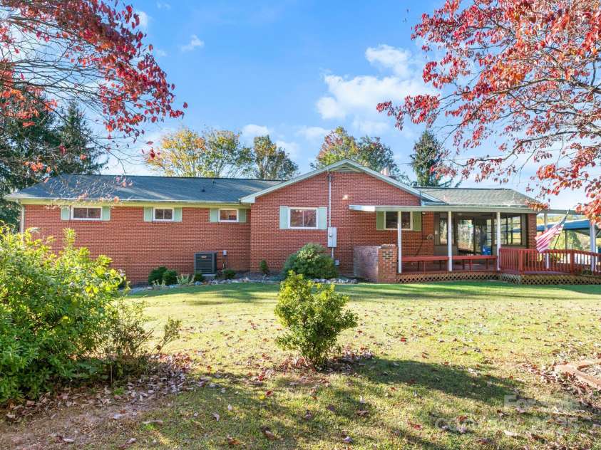 11 Aloha Circle, Candler, NC 28715.  MLS# CAR4313548, YatesRealty ID 605. Front + Carport