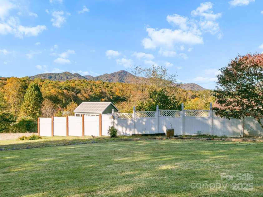 11 Aloha Circle, Candler, NC 28715.  MLS# CAR4313548, YatesRealty ID 605. Yard Looking towards Neighbors