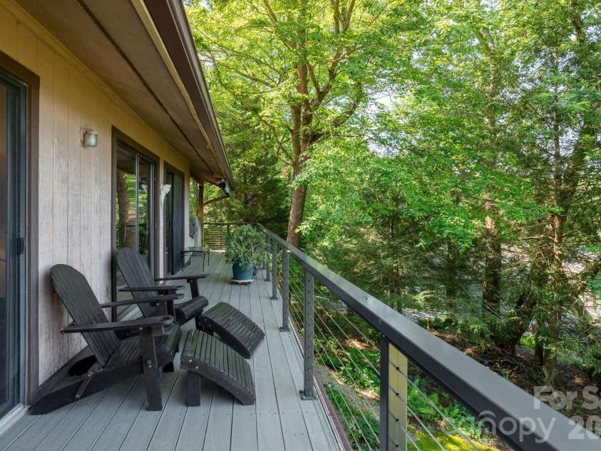 524 Three Mile Knob Road, Pisgah Forest, NC 28768.  MLS# CAR4361023, YatesRealty ID 6052. Large deck