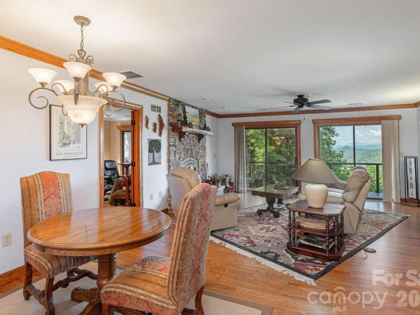 524 Three Mile Knob Road, Pisgah Forest, NC 28768.  MLS# CAR4361023, YatesRealty ID 6052. Open living 