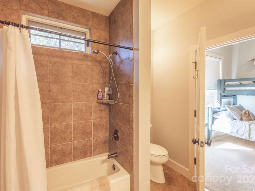 85 Southshore Drive, Tuckasegee, NC 28783.  MLS# CAR4226959, YatesRealty ID 6054. 