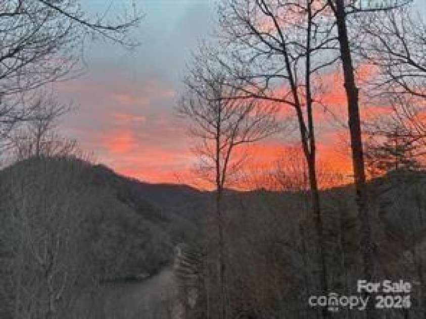 85 Southshore Drive, Tuckasegee, NC 28783.  MLS# CAR4226959, YatesRealty ID 6054. 