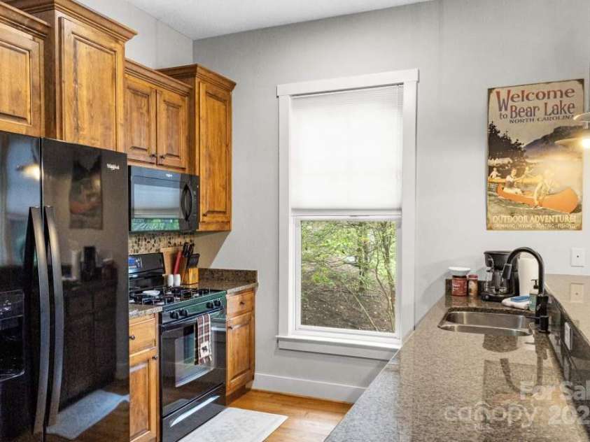 85 Southshore Drive, Tuckasegee, NC 28783.  MLS# CAR4226959, YatesRealty ID 6054. 